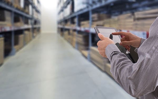 Businessman stock room tablet Businessman stock room tablet